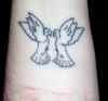 tribal loving dove pics tattoo